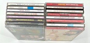 lot 221 image: Collection of 16 Music CDs Including Best of Righteous Brothers, Yanni, and More
