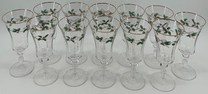 lot 292 image: Set of 12 Mikasa Holiday Champagne Flutes with Holly Design