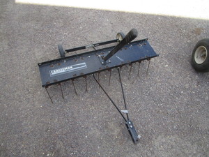 lot 192 image: 40 Lawn De-Thatcher