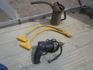 lot 221 image: 12 Porter Cable Electric Drill, (2) Extension Chord 3 Way Splitters, Oil Can