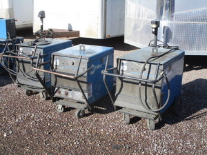 lot 34 image: (3) Miller Welders (1) 452 (2) 302 (working condition unknown)