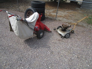 lot 276 image: Vintage Lawn Mower & Industrial Electric Vacuum