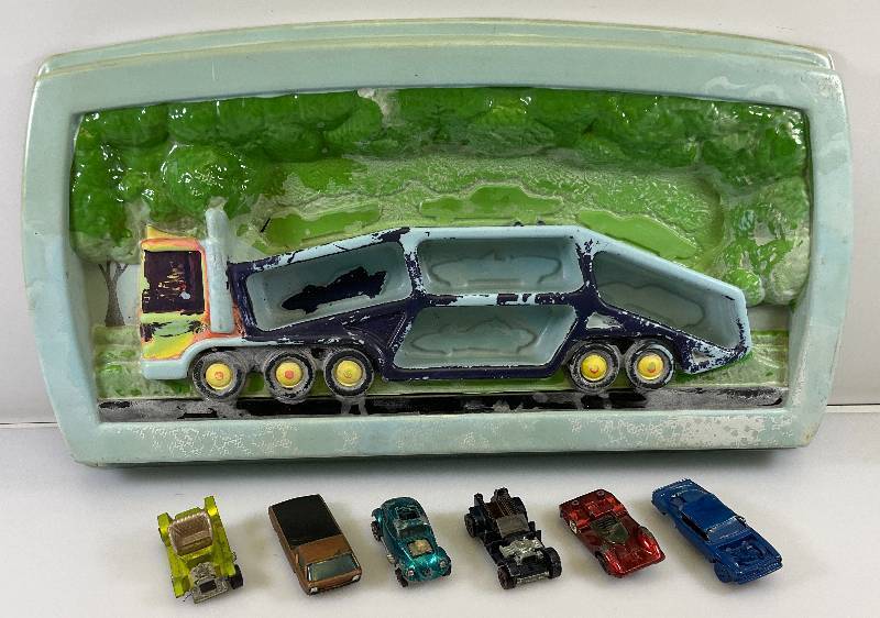 lot 13 image: 1968 Redline Hot Wheels Blue SHOWCASE PLAQUE Car Carrier (AS SEEN WITH REDLINE PARTS CARS)