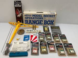 lot 15 image: Misc. Estes Roket Launching Items Including Star Wars X-Wing Fighter, Launching Pad, Engines And More (In Original Box)