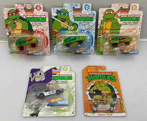 lot 75 image: Collectible TMNT Hotwheels (NIP)