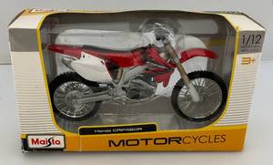 lot 106 image: Maisto 112 Scale Die Cast Honda CRF450R Motorcycle (NIB)