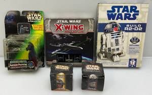 lot 131 image: Misc. STAR WARS Collectibles Including Star Wars Power Of The Force  & More (MOST NIB)