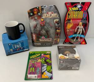 lot 145 image: Misc. Marvel Action Figures And More (NOC)