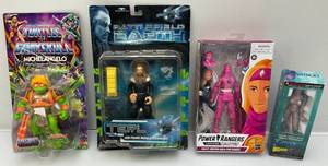 lot 172 image: Misc. Vintage Collectible Action Figures Including TMNT,  Battlefield  Earth And More (NIB)