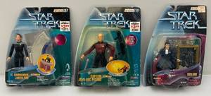 lot 181 image: Vintage Misc. Star Trek Action Figures (NOC) Packing In Rough Shape One Card Yellowed