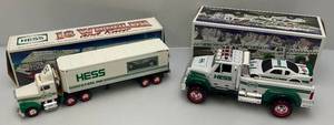 lot 208 image: Vintage HESS Gasolene Collectible Miniature Semi Trailer With Porshe & Truck With Race Car (NIB)