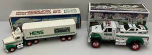 lot 224 image: Vintage HESS Gasolene Collectible Miniature Semi Trailer With Porshe & Truck With Race Car (NIB)