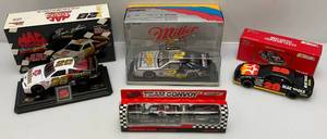lot 228 image: Misc. Miniature NASCAR Die-Cast Collectible Stock Cars Including Davey Allison Bank, Earnhardt Semi, Ernie Irvan & Rusty Wallace (NIB)