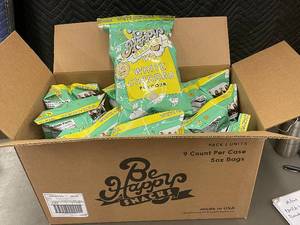 lot 1 image: Case of 9 Be Happy Snacks White Cheddar Popcorn Bags