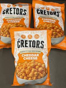 lot 21 image: Set of 3 G.H. Cretors Cheddar Cheese Popcorn Bags, 6.5oz Each