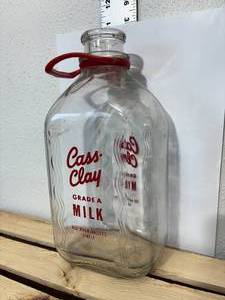 lot 18-F2025 image: Mid-century modern, vintage, glass half gallon, cast clay grade AA milk, red River valleys, finest bottle with original cork 60 Sweet Court trademark