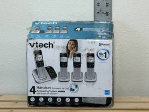 lot 25-F2025 image: VTEC Bluetooth 4 hand set connect to sell answering system with smart call blocker landline phones. Damaged box.