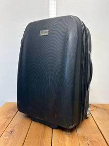 lot 28-F2025 image: Landor and Hawa midsize suitcase used 24 inches tall two wheel roller, 12 inches deep can expand another 2 inches hard shell wheels in great condition