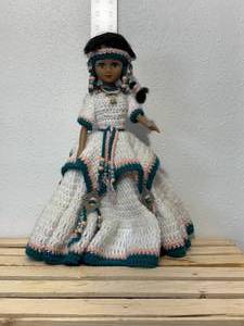 lot 29-F2025 image: 14 inch doll hand crocheted dress with bead and silver toe embellishments tall is made in China one081. Comes with doll stand.