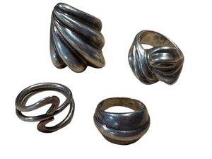 lot 15G image: Collection of 4 Vintage Sterling Silver Rings in Assorted Designs