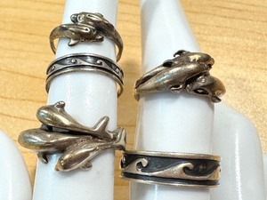 lot 25G image: Set of 5 Sterling Silver Dolphin and Wave Rings with Varied Sizes