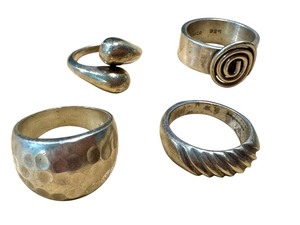 lot 29G image: Collection of 4 Sterling Silver Rings with Unique Designs