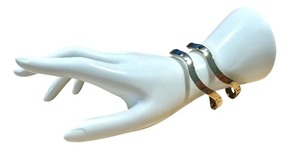 lot 93G image: Pair of Sterling Silver Wave Design Bracelets