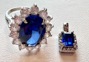 lot 2G image: 14K Sapphire Halo Ring with Moissanite Accents and Stauer Sterling Pendant