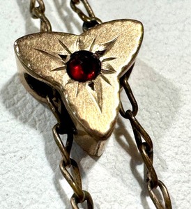 lot 25J image: Antique Gold Plated Watch Fob Slide Chain with Red Gemstone, 27 Inches