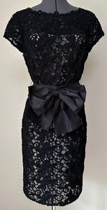 lot 109 image: Sherrie Bloom and Peter Noviello for Chetta B - Black Lace Cocktail Dress with Bow Belt - Size 8