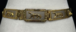 lot 10 image: Vintage 1990s Metal Jacquard Panther Motif Belt