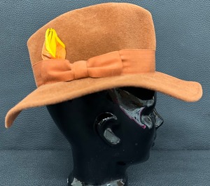 lot 29 image: Makins Brown Felt Wide Brim Hat with Feather Accent Bonwit Teller