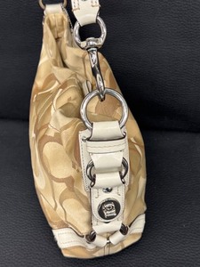 lot 110R image: Coach Carly Signature Tan Canvas Leather Trim Hobo Shoulder Bag