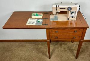 lot 65 image: Vintage Universal Sewing Machine Model KTBR in Original Cabinet