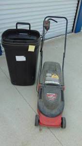 lot 19 image: Yard Machine 13 in Electric Mower and Trash Can No Lid