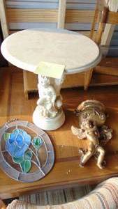 lot 58 image: Faux Marble Top Cherub Table, Wall Decor and Stained Glass Hanging