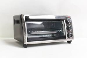 lot 66 image: BLACK  DECKER 4-Slice Toaster Oven - Stainless Steel