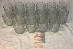 lot 27 image: Princess House Fantasia Glass Mug - Embossed Poinsettia Floral Pattern