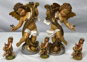 lot 64 image: Vintage Pair of Fontanini Cherub Candle Holders #5042 and #5043 and Fontanini Drummer Boy with Sheep #637