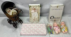 lot 66 image: Vintage Doll Collection - 6 Gerber Brithday Baby Twins in Original Box, Show Stoppers Porcelain Doll in Buggy, and Show Stoppers Joyful Baby in Original Box