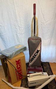 lot 123 image: Oreck Commercial XL Upright Vacuum Cleaner Model Xl2400RS and Oreck XL Compact Canister Vacuum Cleaner with attachments