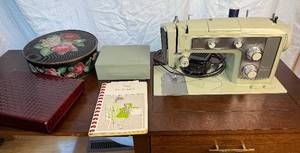 lot 119 image: Sears Kenmore All Metal Sewing Machine in Cabinet Model 158.16011