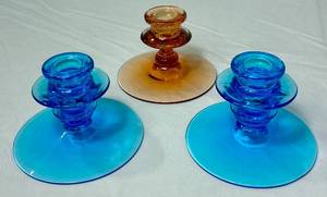 lot 52 image: Vintage Fostoria Amber and Electric Blue Candlestick Holders
