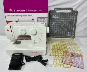 lot 51 image: Singer 1412 Promise Sewing Machine, Quilting Rulers and June Tailor Quilters Cut n Press Mat