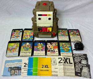 lot 70 image: 1970s Mego 2-XL Talking Robot Toy 8 Track Player with Cord and Games