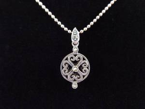lot 37 image: .925 Sterling Silver Art Nouveau Scrolled Wheel Pendant Necklace