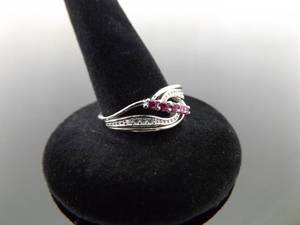 lot 65 image: NEW .925 Sterling Silver Ruby Crystal Ring Size 7.75