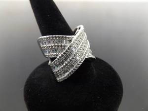 lot 79 image: .925 Sterling Silver Zirconia Baguette Crossover Band Ring Size 7