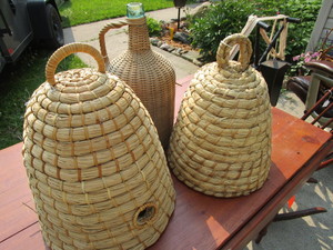 lot 9 image: Large Bee Skep Basket Covers, Wicker Wrapped Bottle