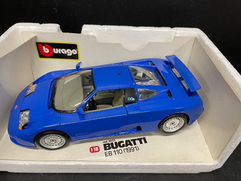 lot 143 image: Bugatti EB 110 (1991) Burago scale model car, NIB
